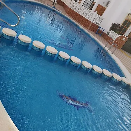Mi Casita En Con Piscina Comunitaria Y Barbacoa Privada Сasa de vacaciones Torrevieja