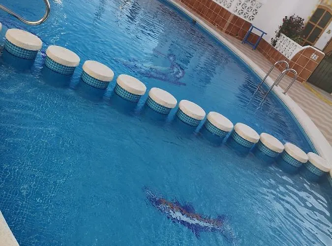 Mi Casita En Con Piscina Comunitaria Y Barbacoa Privada Сasa de vacaciones Torrevieja